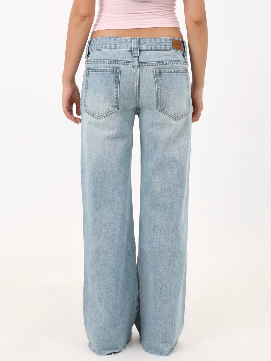Low-rise straight-leg ripped jeans
