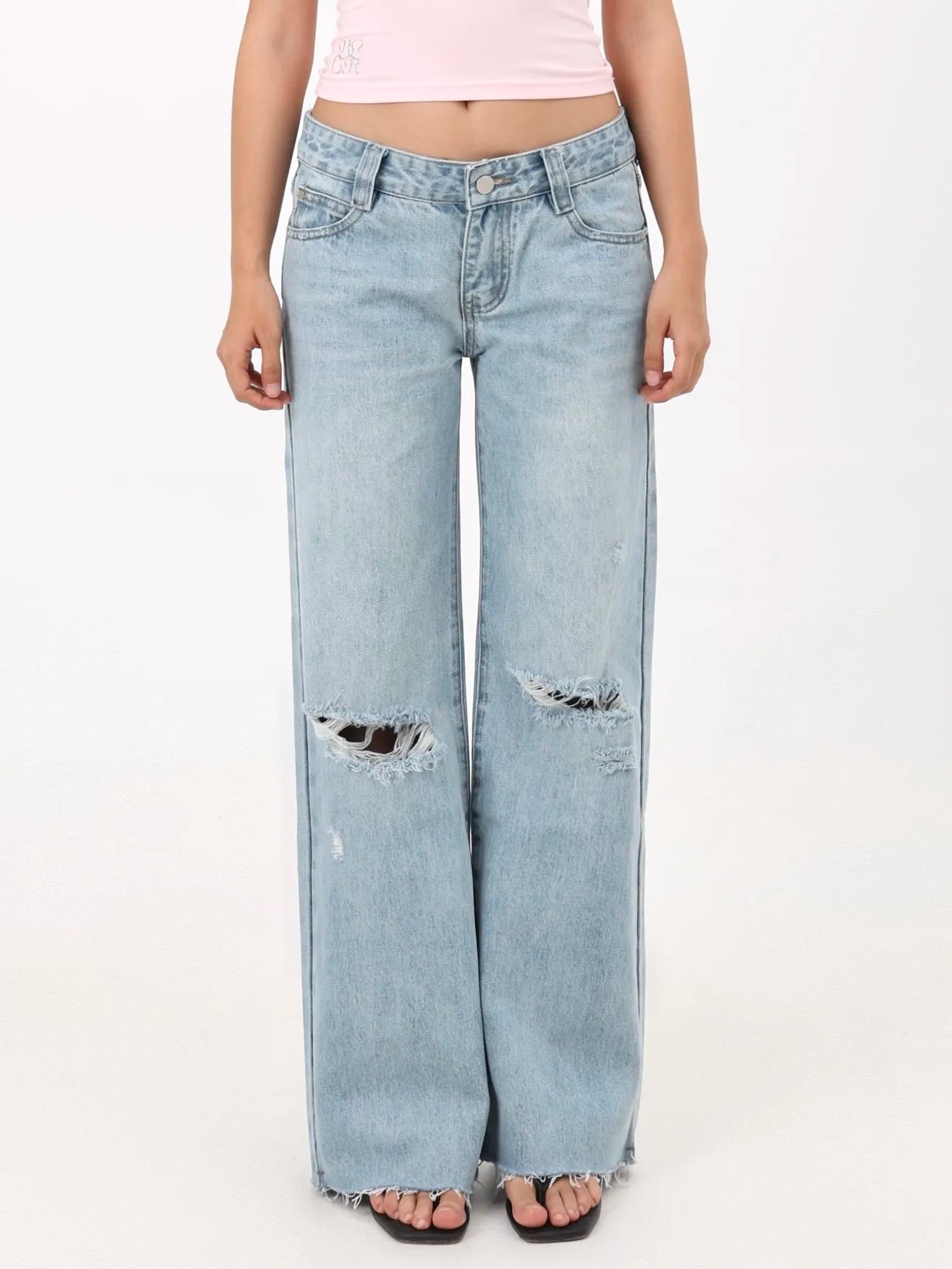 Low-rise straight-leg ripped jeans